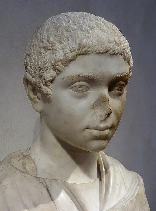 "A bust of Heliogabalus from early in her reign. These busts were mass produced and distributed around the empire so that folks would know what their emperor looked like. Her nose was smashed off, posthumously."